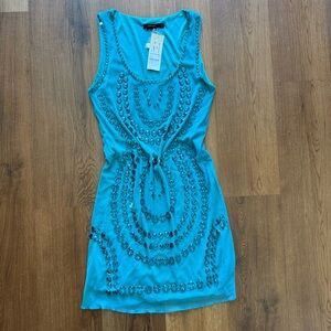 Vertigo Lycra Dress with Sequins jewels size large. Sheer overlay.